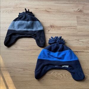The Children’s Place - cozy Black and Blue Pom-Pom Fleeced Winter Hats.